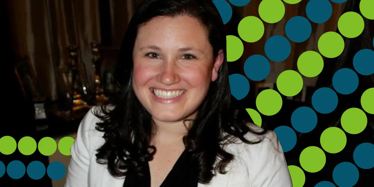 Leigh smiles at the camera for 8THIRTYFOUR in Grand Rapids.