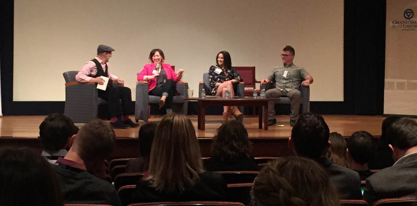 Several speakers discuss graphic design in public relations at a GVSU PRSSA event.