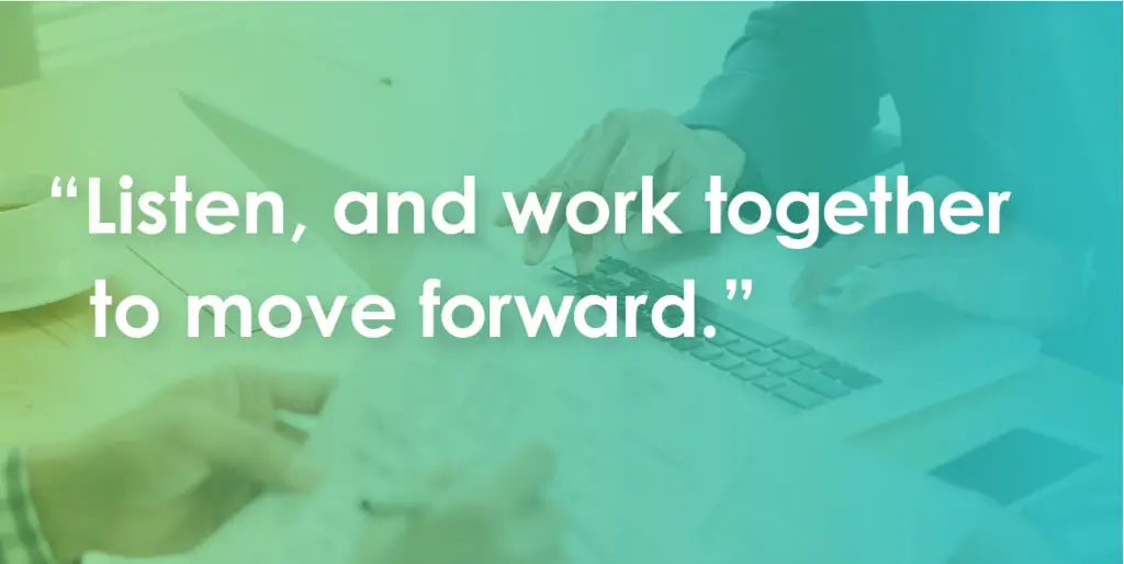 Two people sit opposite from each other at a desk while text over them reads, "Listen, and work together to move forward."