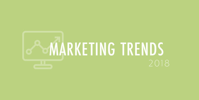 A green background features a cartoon laptop and the words, "Marketing Trends 2018"