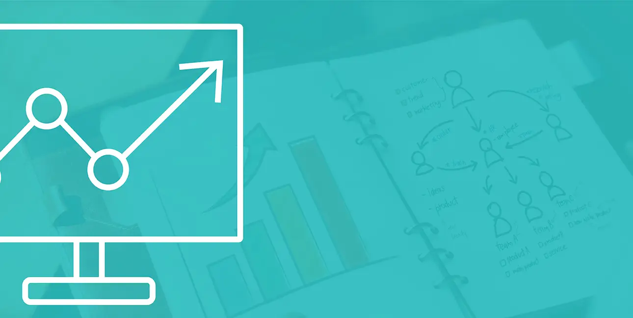 A notebook is open to what appears to be brainstorming for a company's marketing plan