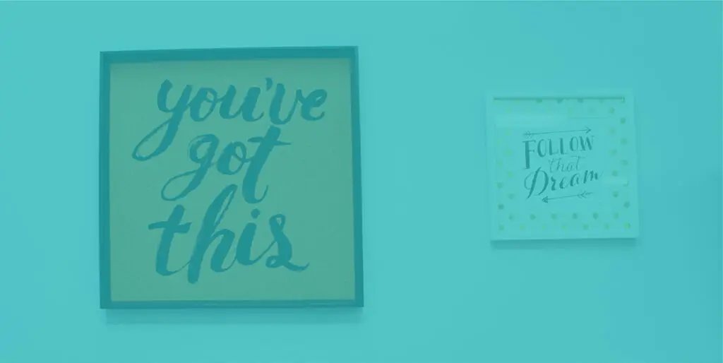 Signs in the 8THIRTYFOUR office read, "You've got this" and "Follow that dream."
