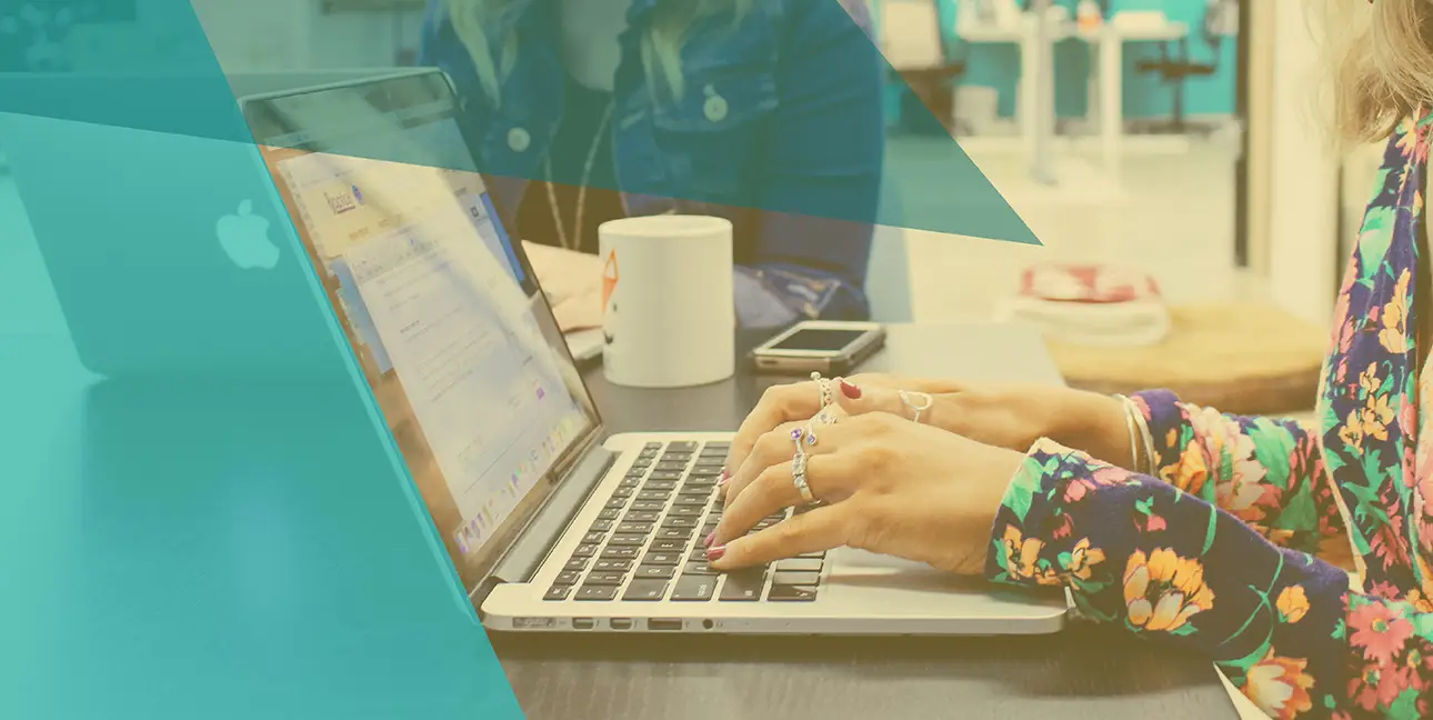 Morgan Shaffer works at her laptop in the 8THIRTYFOUR office during her internship