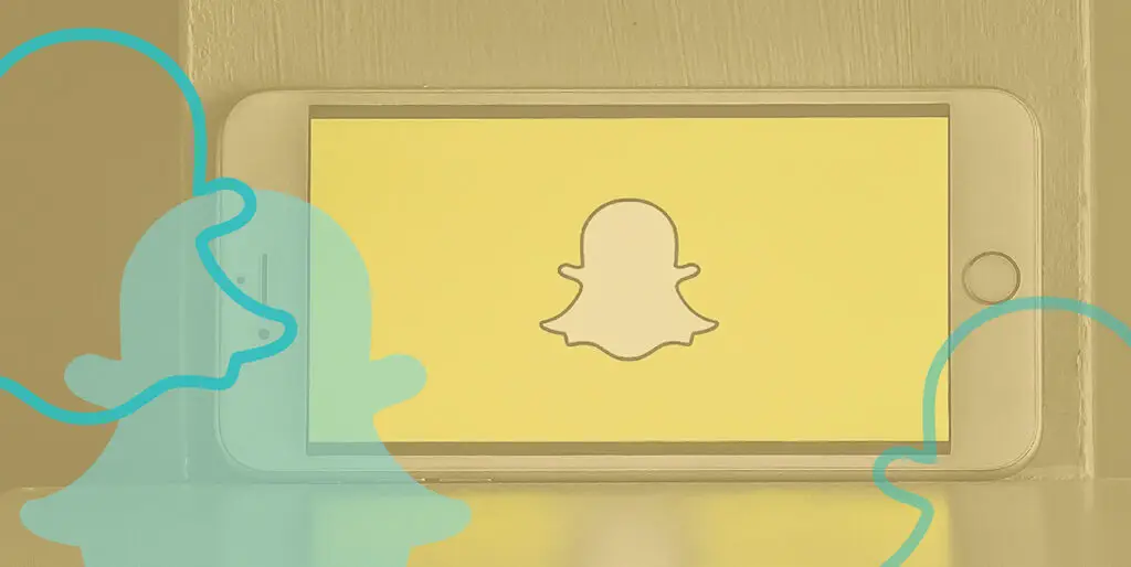 An iPhone displays the SnapChat ghost