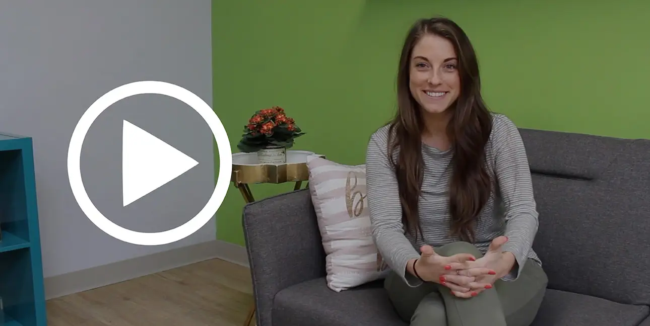 Emily Potts smiles at the camera while sharing her favorite icebreakers in the 8THIRTYFOUR office.