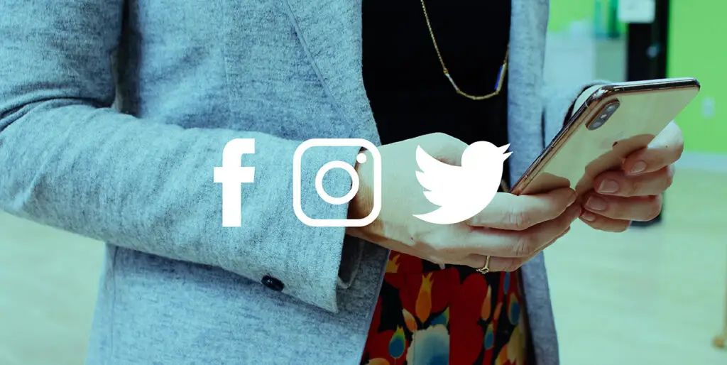 8THIRTYFOUR's owner, Kim Bode, browses her phone while icons for Facebook, Instagram, and Twitter are superimposed over her.