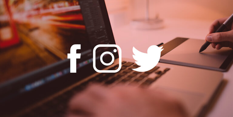 An image of a laptop with social media sharing icons overlay.