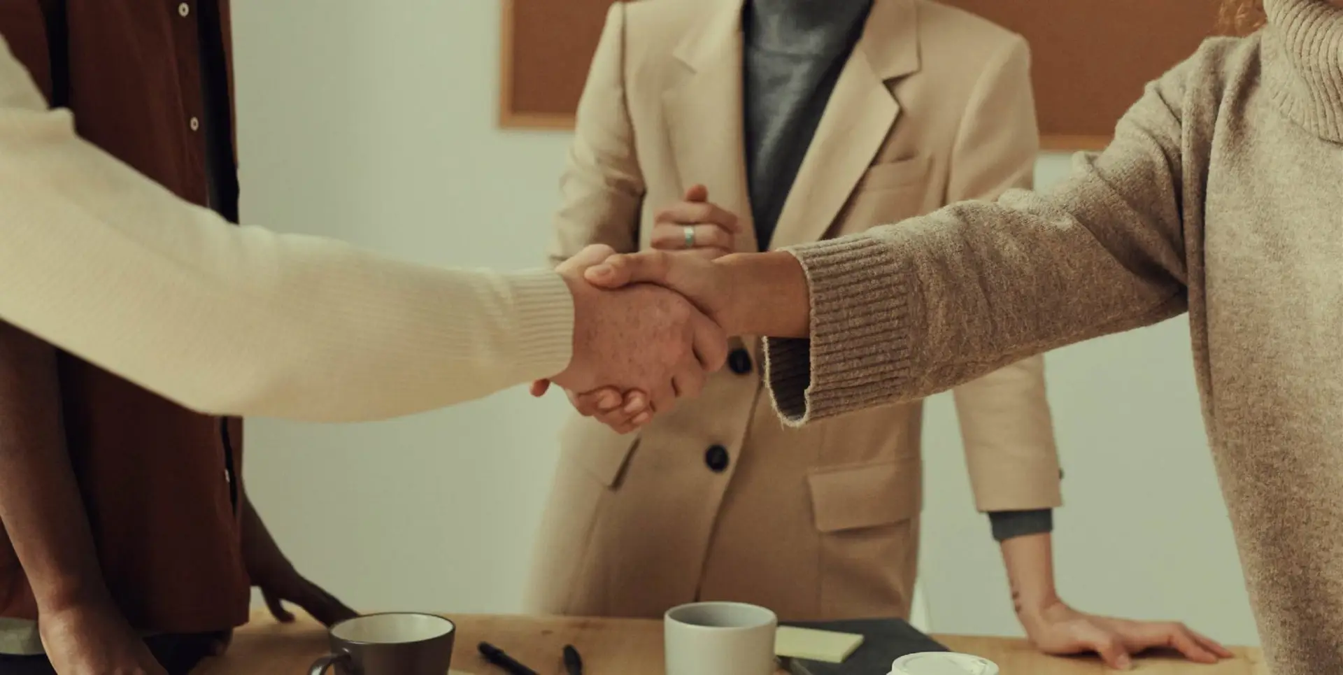 An image of two people shaking hands.