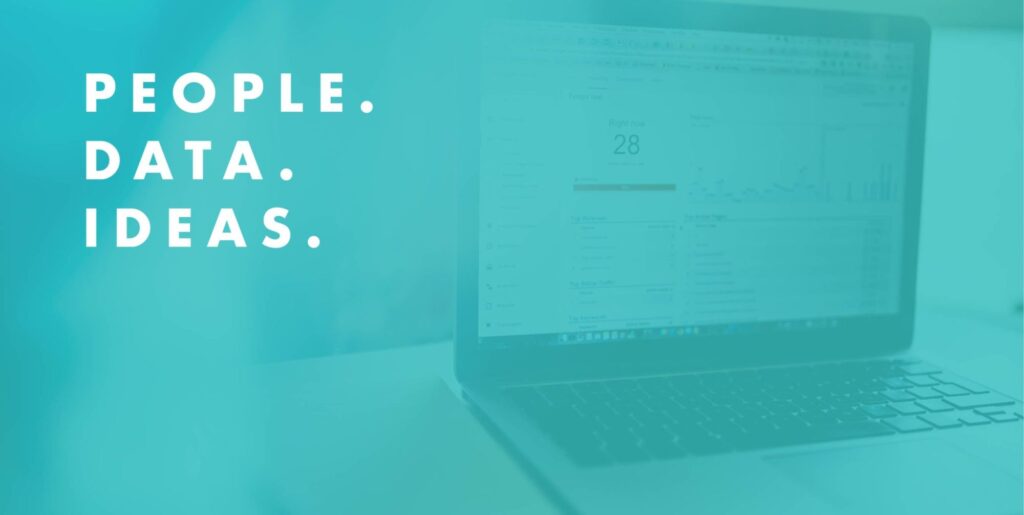 An image of a laptop with a blue overlay that says "People. Data. Ideas."