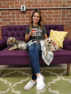 Jen sitting on the couch in the 8THIRTYFOUR office.