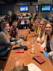 A photo of the 8THIRTYFOUR team eating lunch during the Chicago team trip.