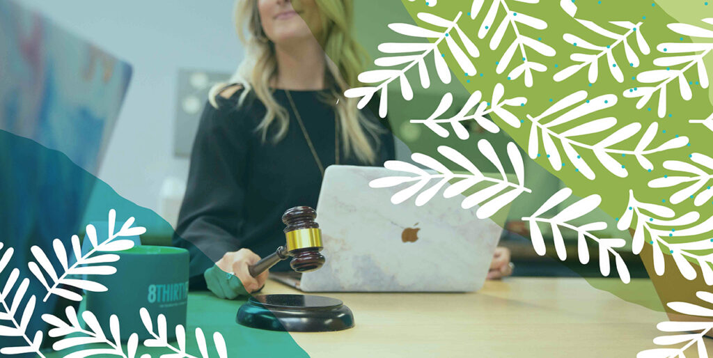 Jen, Principal of 8THIRTYFOUR, laying down the gavel after a team meeting.