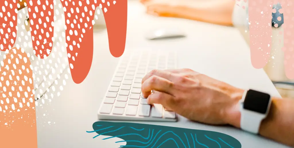 Man typing on keyboard