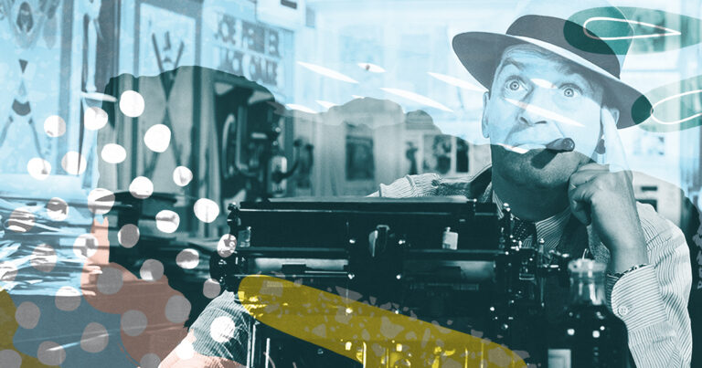 man at a typewriter with cigar