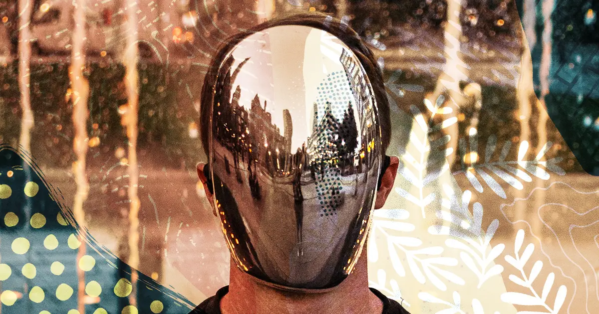 Man with mirror mask on