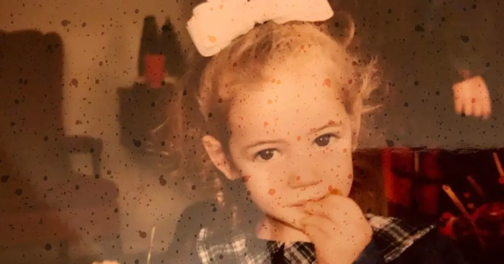 Young Ro looks at the camera.