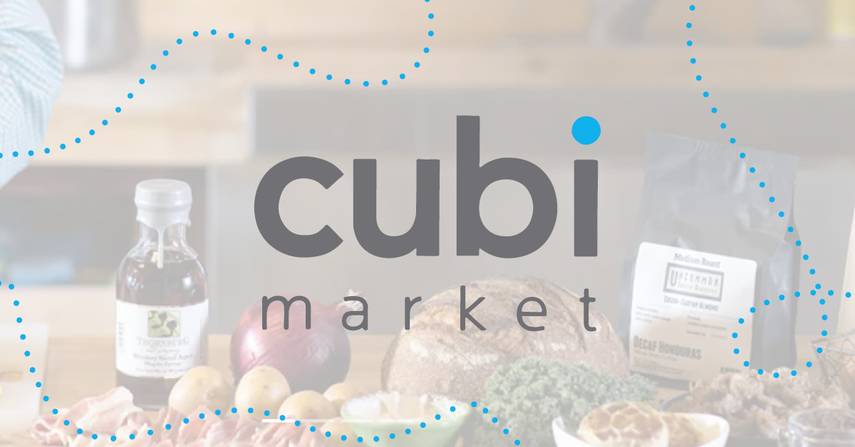 Cubi Market logo over a white overlay and groceries sitting on a counter.