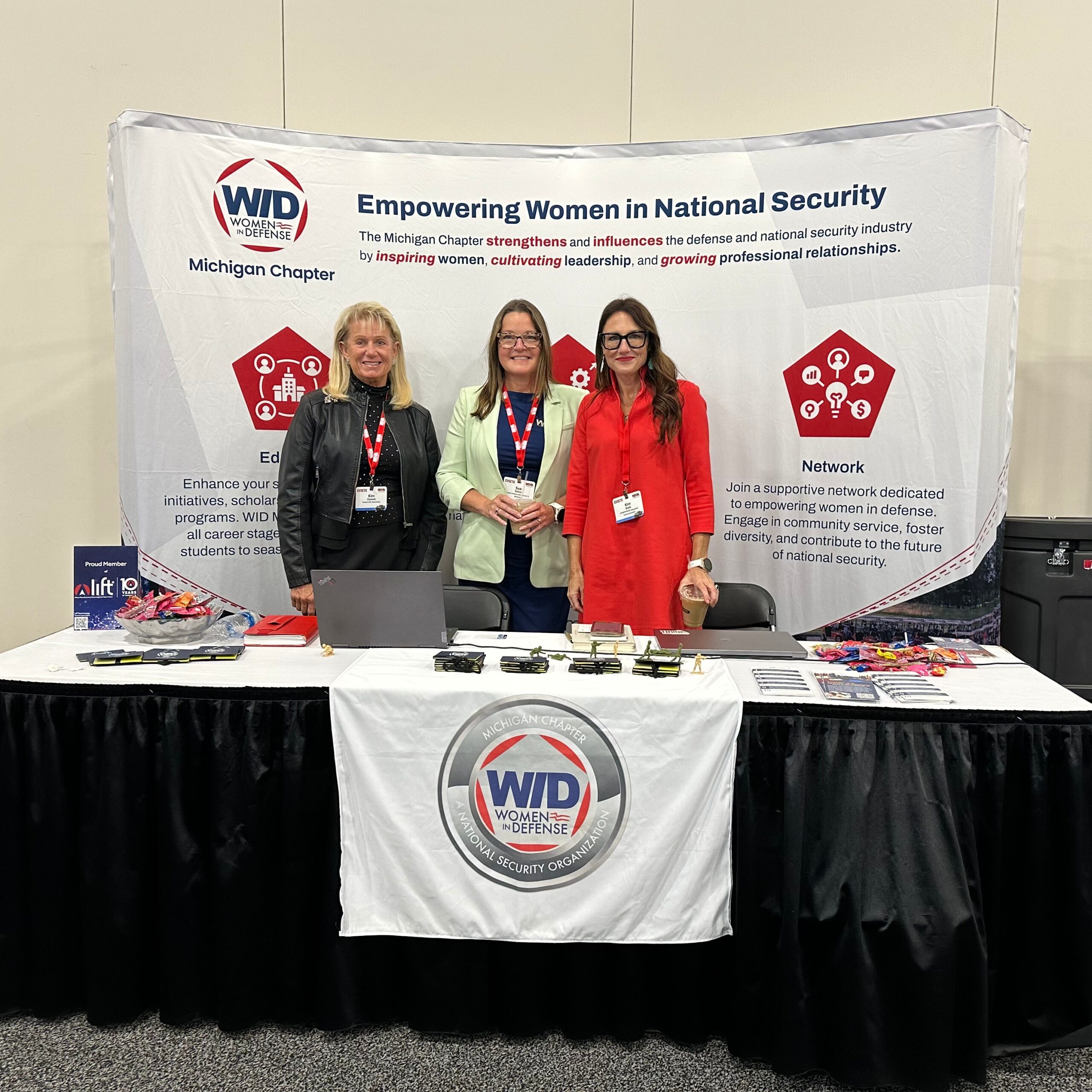 Kim Bode poses with Women in Defense Michigan