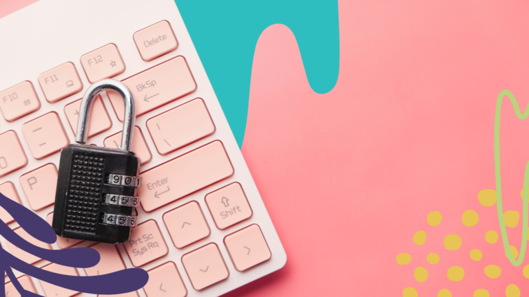 A keyboard sits on a table and a black combination lock sits on top.
