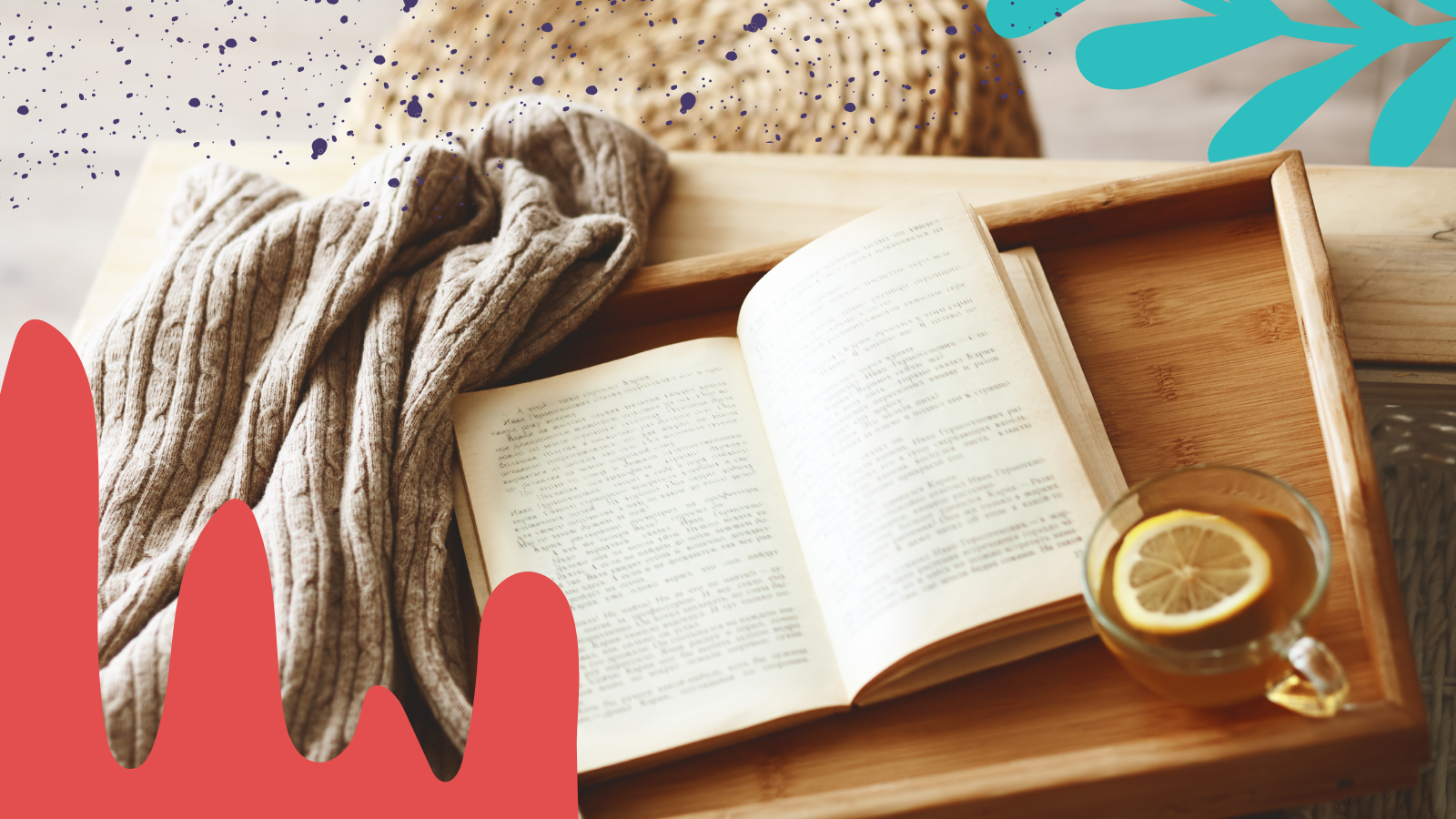 A book and warm tea sits on a wooden tray while a person cuddles with a blanket in bed.