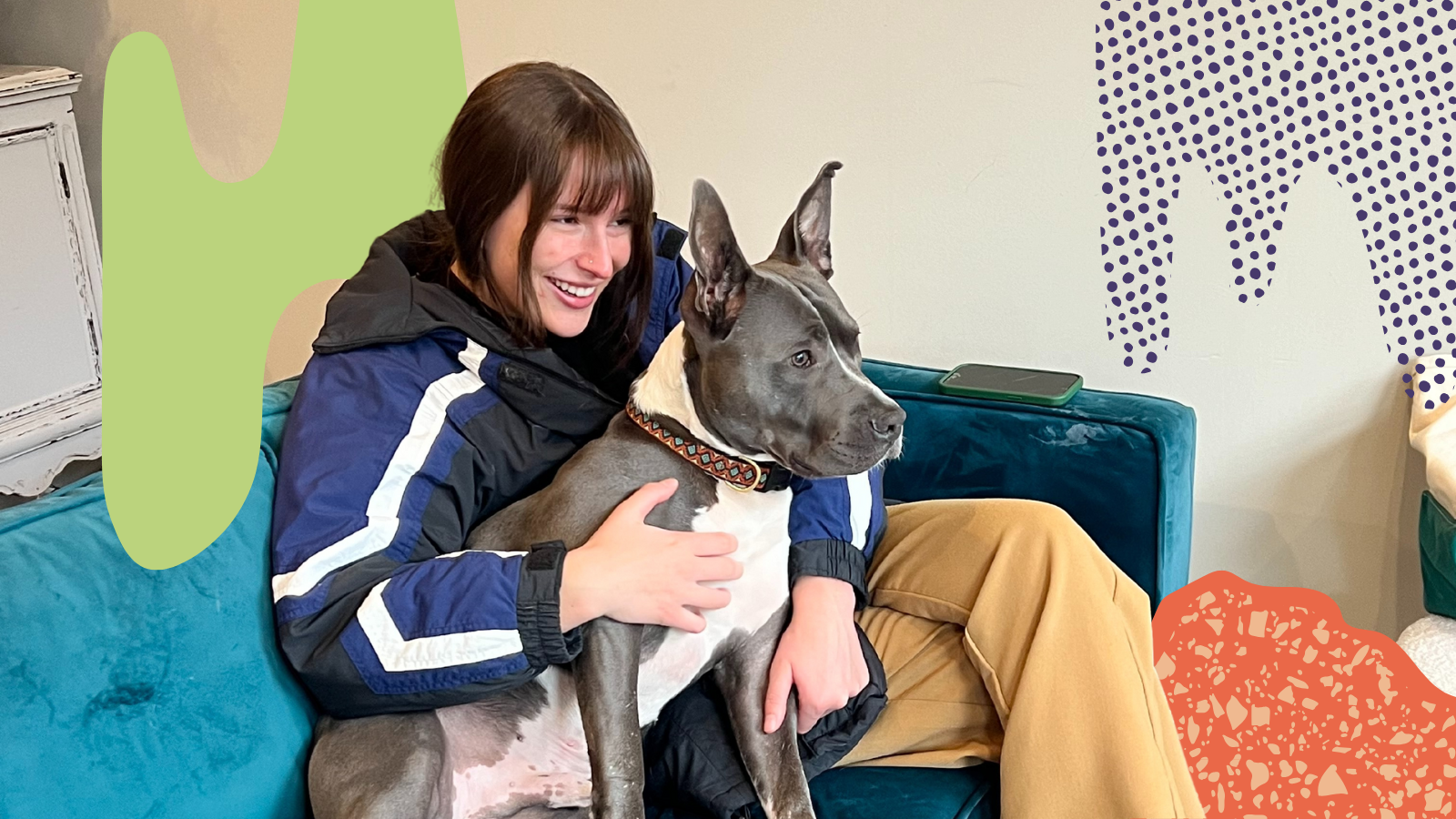 A photo of Noelle Hintzke with office dog, Frank!