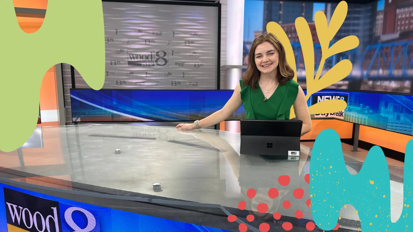 Elena Cousino smiles at the WOODTV8 news desk.