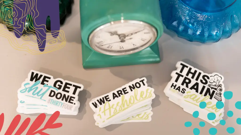 Stickers at the 8THIRTYFOUR office say, "This train has sailed" and "We are not assholes."