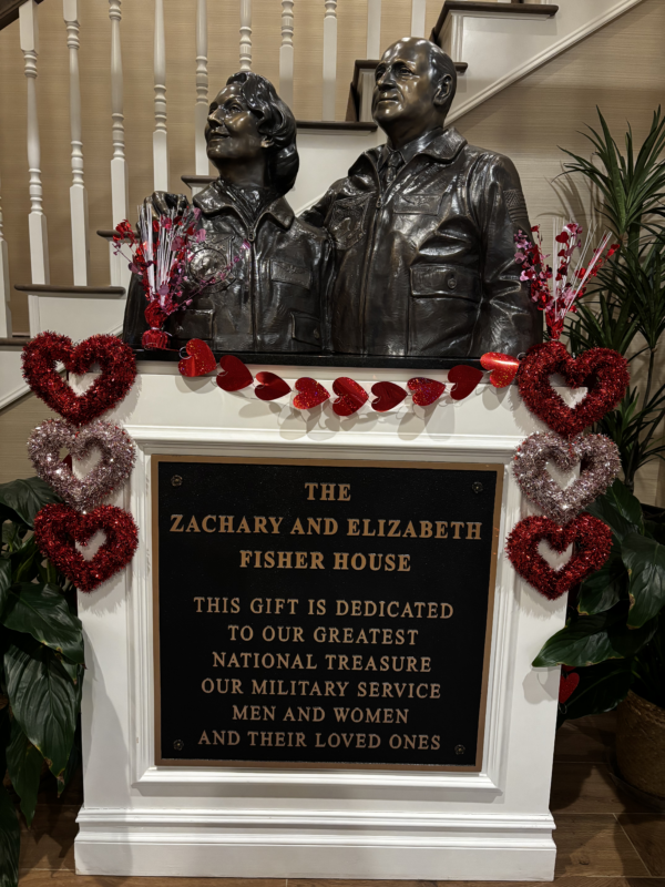 a plaque inside the fisher house