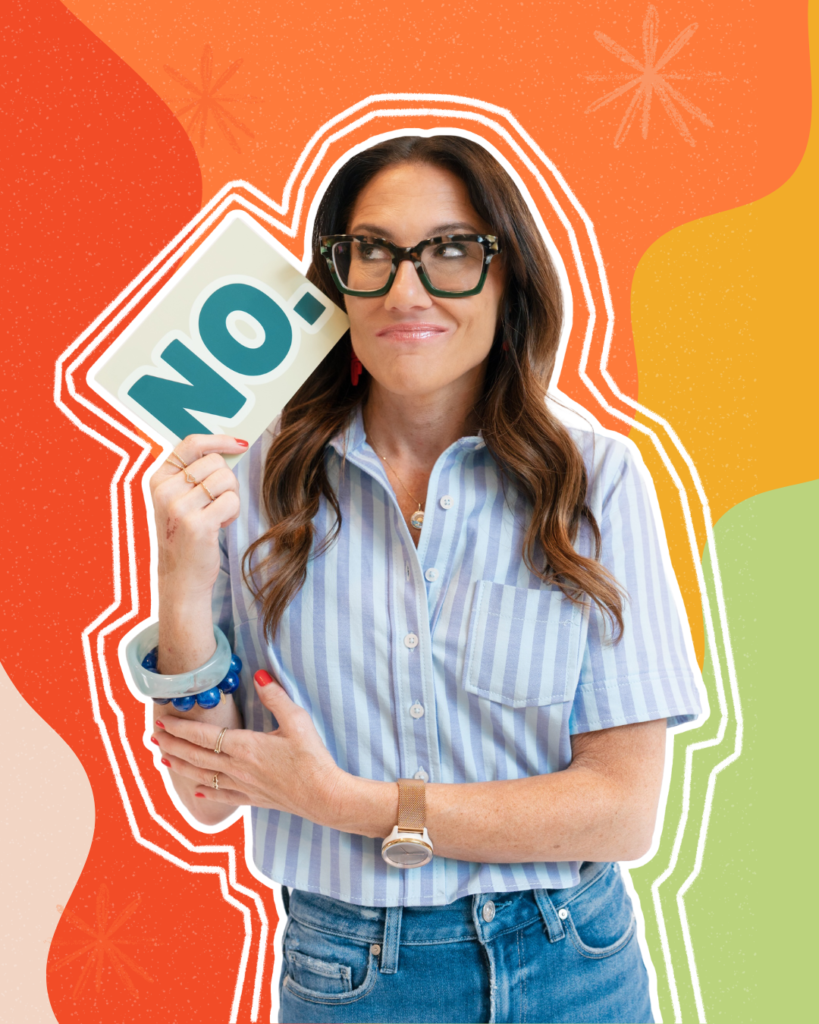 woman holding a post card that says no