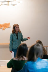 woman giving a presentation to a group