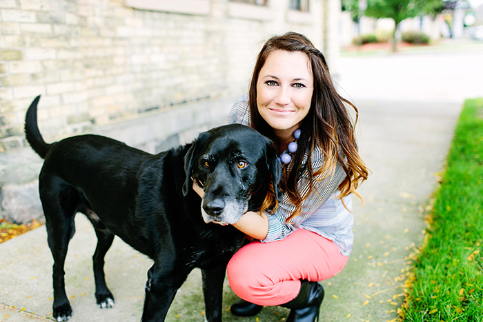 Kim hugs a big dog
