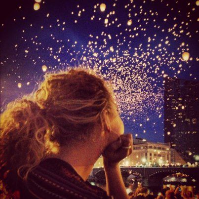 Girl looks out at the night sky