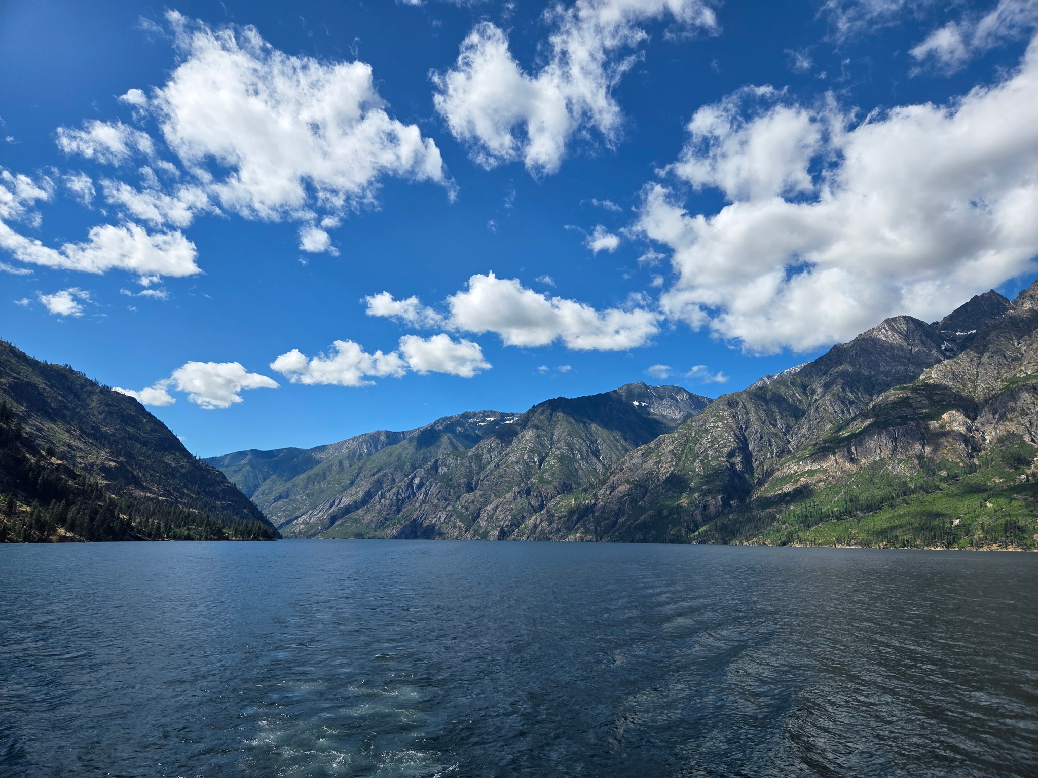 Lake with mountains in the background in